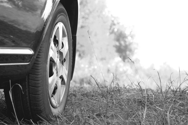 Car wheel closeup. Black and white photo. — Stock Photo, Image