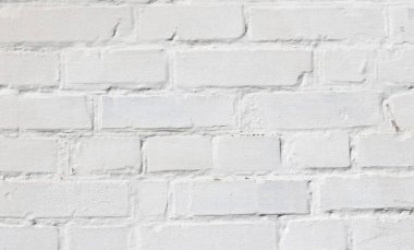 Beyaz boyalı eski tuğlalar, tuğlalar ve çatlak tuğlalarla dolu güzel bir arka plan.