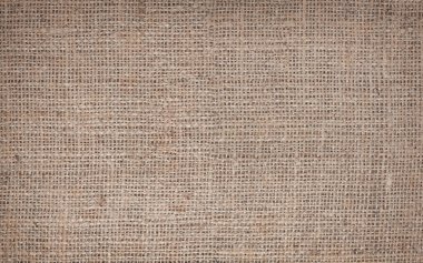 Reklam metni ya da diğer yazıtları yerleştirmek için kahverengi kumaşın güzel tuval dokusuna sahip kahverengi çuval bezi