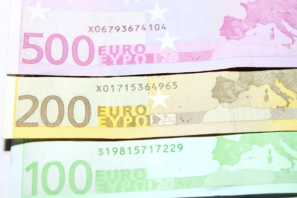 One hundred, two hundred and five hundred euro banknotes closeup. Shallow focus. — Stock Photo, Image