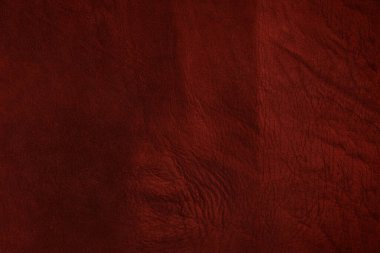 Beautiful red background with leather texture with red veins of red leather background as sample of red background from natural leather or sample of texture of leather for beautiful natural background
