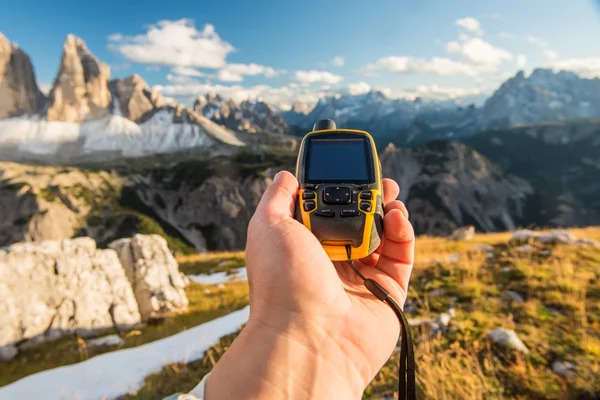 GPS navigator in hand — Stock Photo, Image