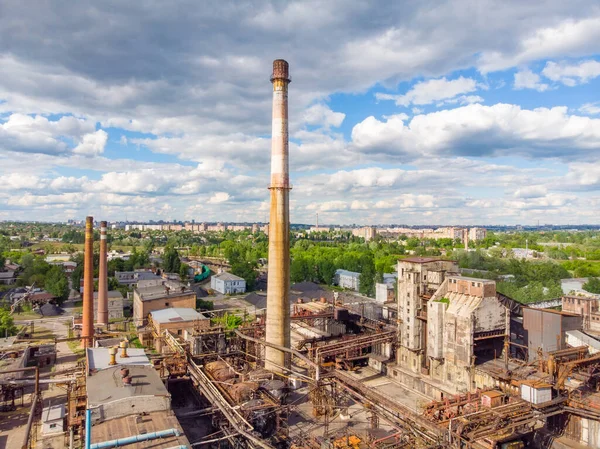 Aerial drone shot of old industrial zone with smoke stack. Air pollution concept — Stock Photo, Image