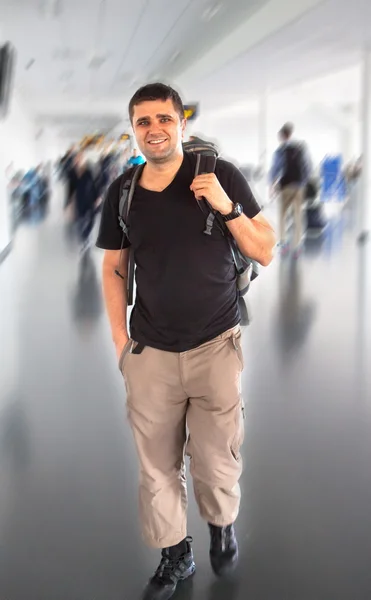 young tourist man in airport. Travel concept
