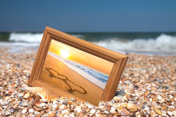 Love concept  - two hearts on sand — Stock Photo, Image