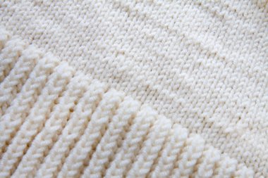 Beyaz örgü yün dokusu arkaplanı.