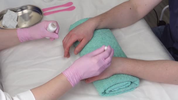 Hand Care Beautician Appointment Applying Moisturizer Wrapping Hands Sticks Beautician — Stock Video