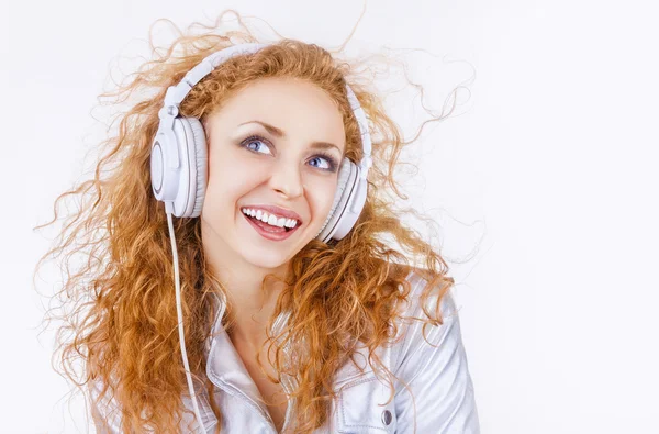 Mujer con auriculares —  Fotos de Stock