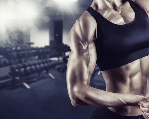 Vrouw lichaam bodybuilder — Stockfoto