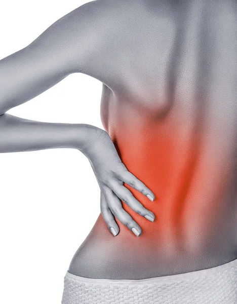 Mujer joven con dolor de espalda — Foto de Stock