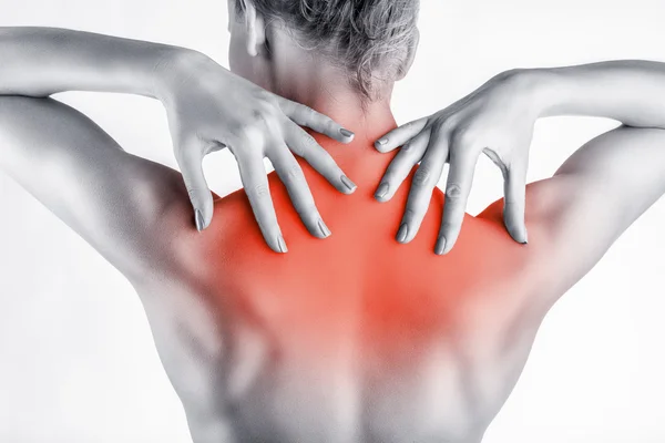 Mulher com dor nas costas — Fotografia de Stock