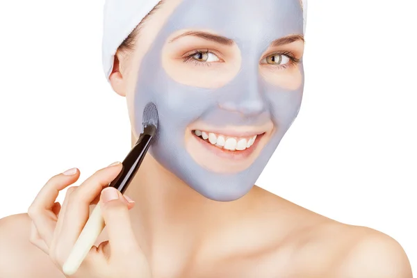 Donna con maschera cosmetica — Foto Stock