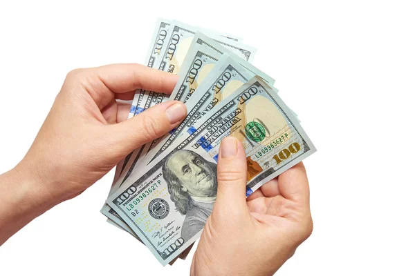 Dollar i händerna på en vit bakgrund — Stockfoto