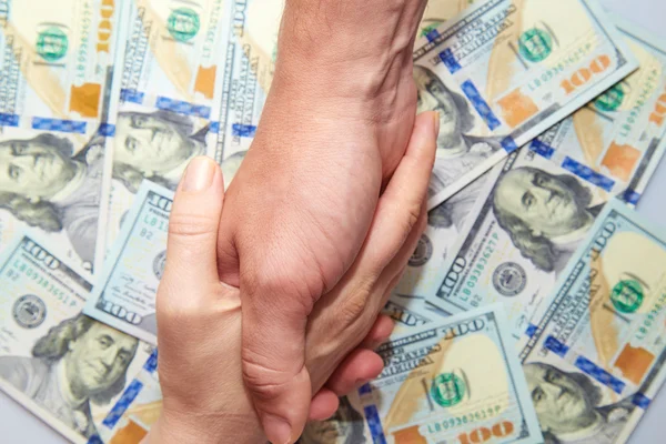 Handshake mot dollarn anteckningar — Stockfoto