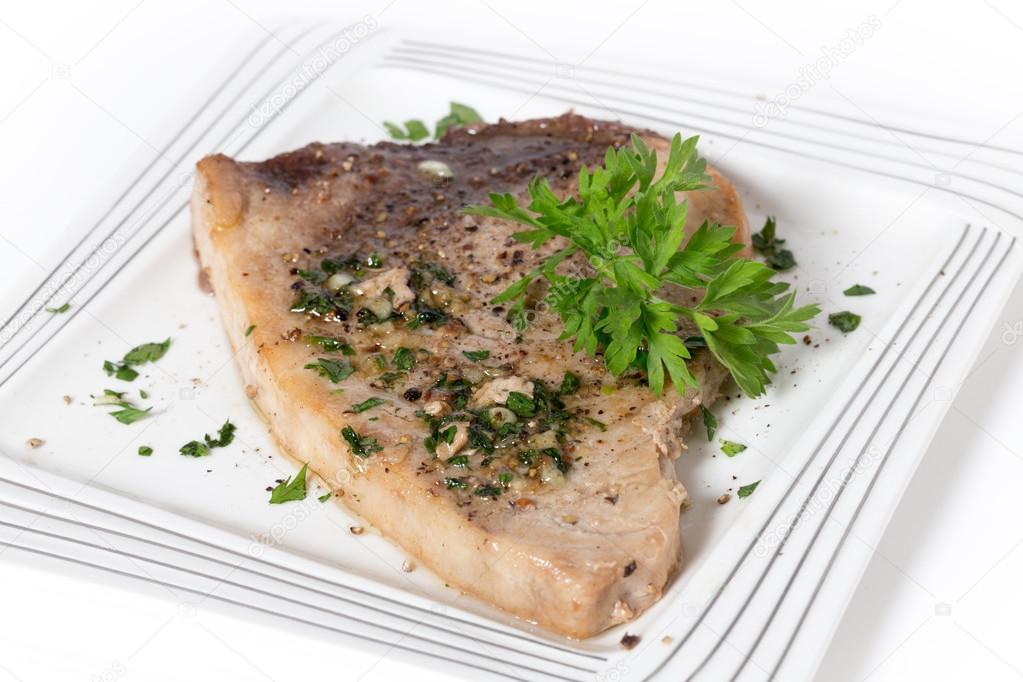 Garnished swordfish steak