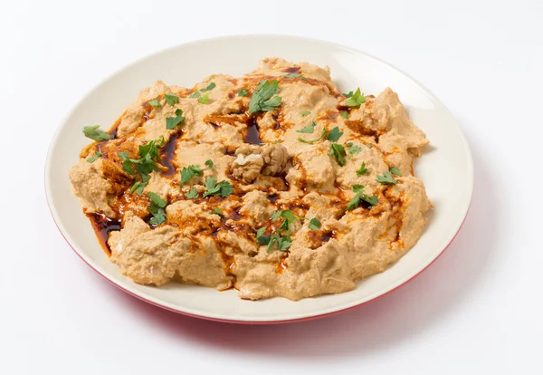 Serving plate of circassian chicken in walnut sauce — Stock Photo, Image