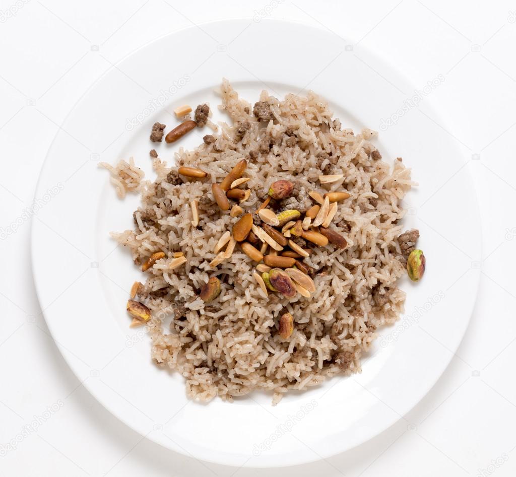 Top view of a plate of Lebanese spiced rice and beef