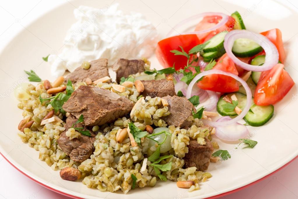 Boiled beef with freekeh cereal