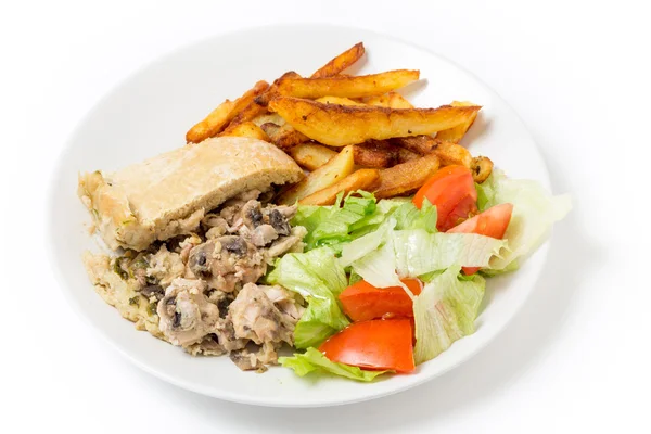 Chicken pudding dinner with fries and salad — Stock Photo, Image