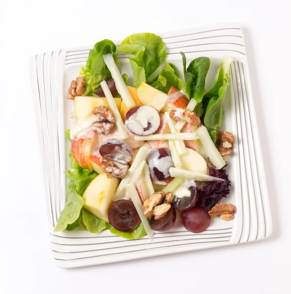 Waldorf salad over white from above — Stock Photo, Image