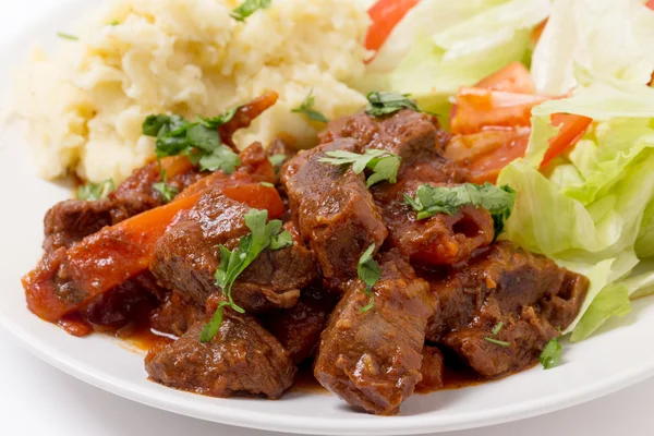 Griechisches Rindfleisch in roter Sauce — Stockfoto