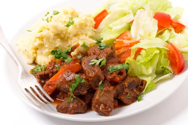 Griechisches Rindfleisch in roter Sauce — Stockfoto