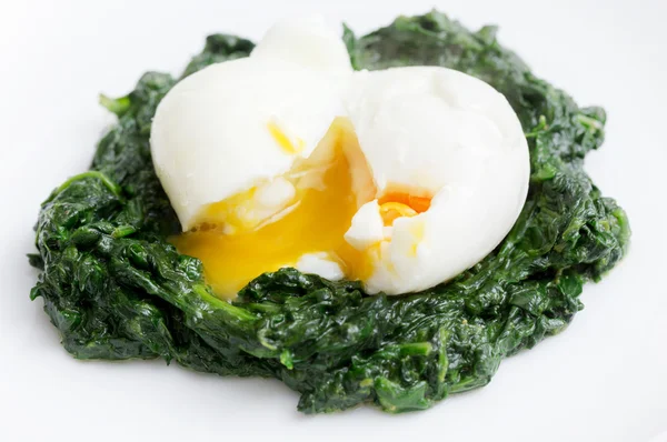 Boiled egg and spinach — Stock Photo, Image