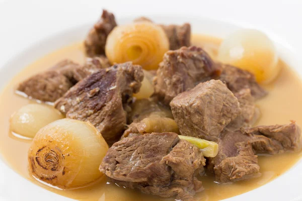 Lamb fricassee with onion macro — Stock Photo, Image