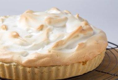 Meringue pie fresh from the oven clipart
