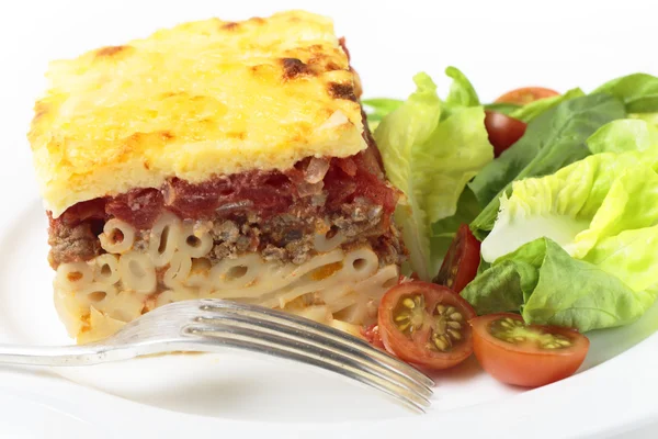 Pastitsio yemek çatal ile — Stok fotoğraf