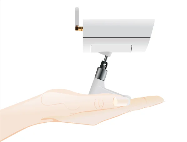 Hand som håller Trådlös Övervakningskamera — Stock vektor