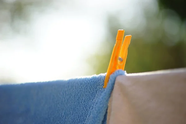 Beigeand Blue Clothes Dried Yellow Plastic Clothespin Outdoor — Stock Photo, Image