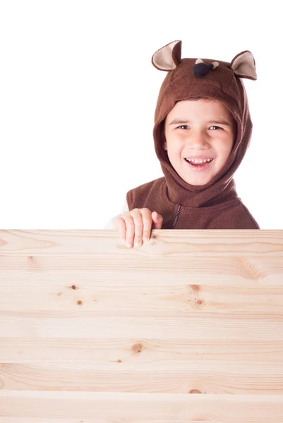 Cute little boy in a bear suit — Stock Photo, Image