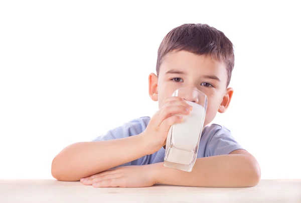 Cute boy with milk glass — Stock Photo, Image