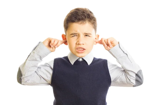 Cute boy putting his fingers in ears — Stock Photo, Image