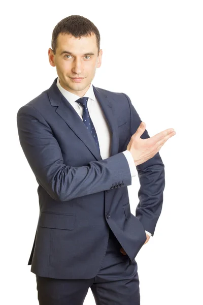 Businessman pointing showing copy space — Stock Photo, Image