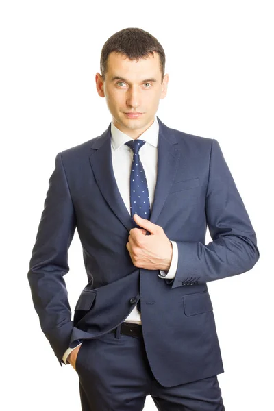 Egy elegáns öltönyt viselő fiatal üzletember — Stock Fotó