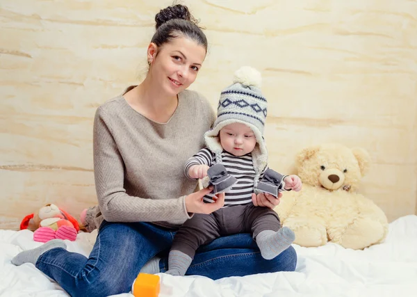 Adorable young baby in a winter outfit — Stock Photo, Image