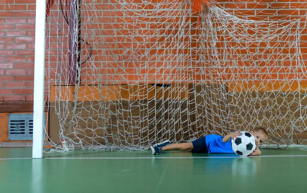 Young goalie saving a goal — Stock Photo, Image