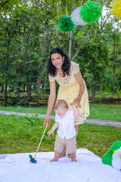 Attractive young mother with her toddler son — Stock Photo, Image