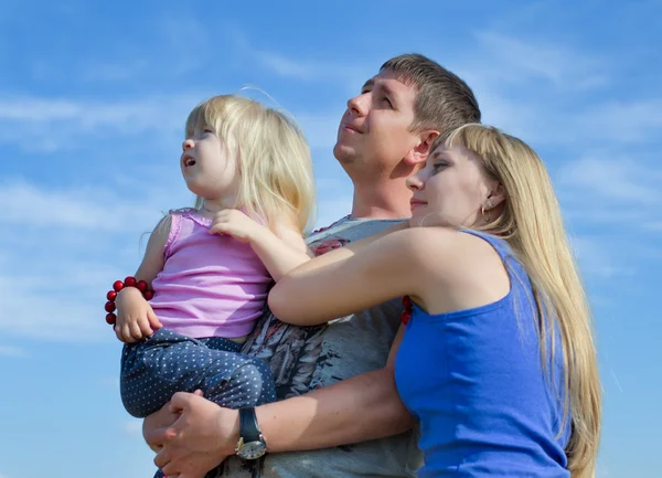 Young parents with their small daughter — Stock Photo, Image