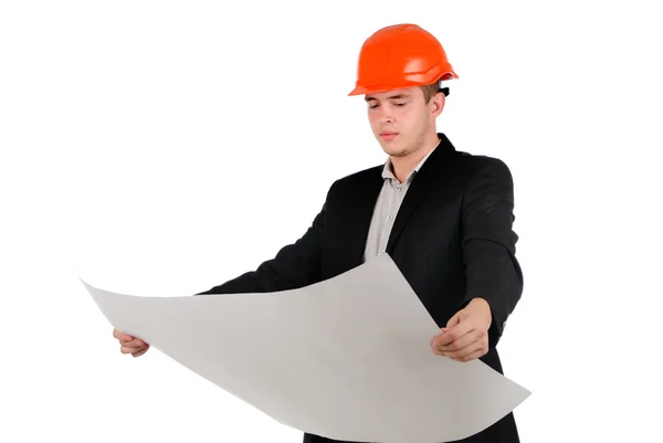 Young architect or engineer studying a plan — Stock Photo, Image