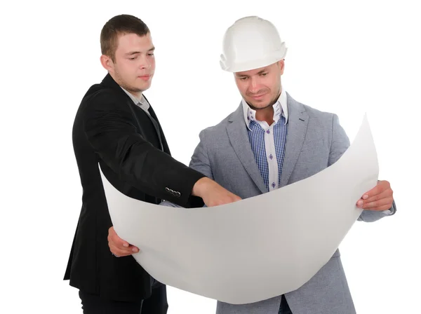 Dois engenheiros discutindo um projeto de construção — Fotografia de Stock