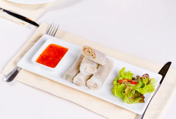Tasty Sliced Spring Rolls with Lettuce and Sauce — Stock Photo, Image