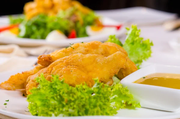 Delicious fried fish with tartare sauce — Stock Photo, Image