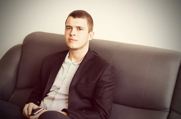 Close up Sitting Gorgeous Man in Black Coat — Stock Photo, Image