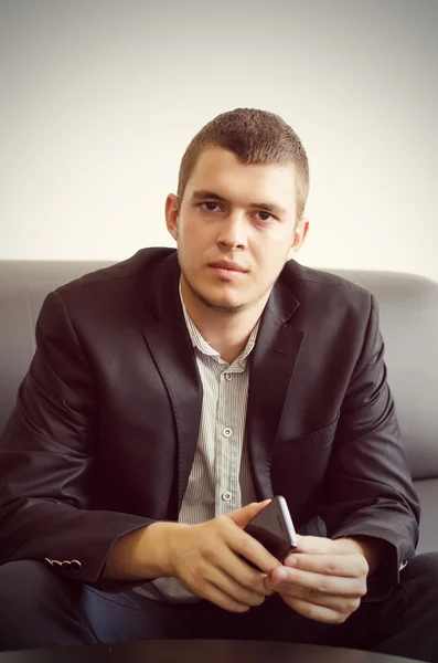 Close up Sitting Gorgeous Man in Black Coat — Stock Photo, Image