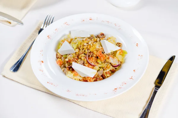 Roast meat on a bed on savory rice — Stock Photo, Image