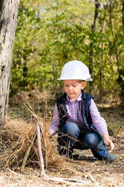 Cute Little Boy Playing with Sticks at the Woods — Stock Photo, Image