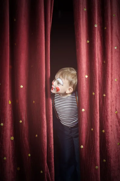 Boy Dressed Up as Clown Peeking Thru Stage Curtain — Stock Photo, Image